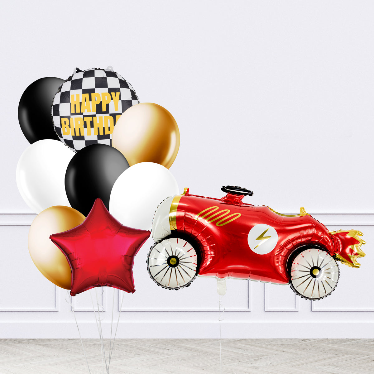 Racing car birthday helium balloon set with red stars and black, white and gold balloons